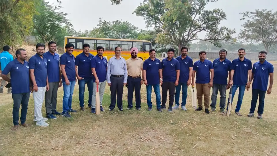 Campus community — faculty sports day group photo.