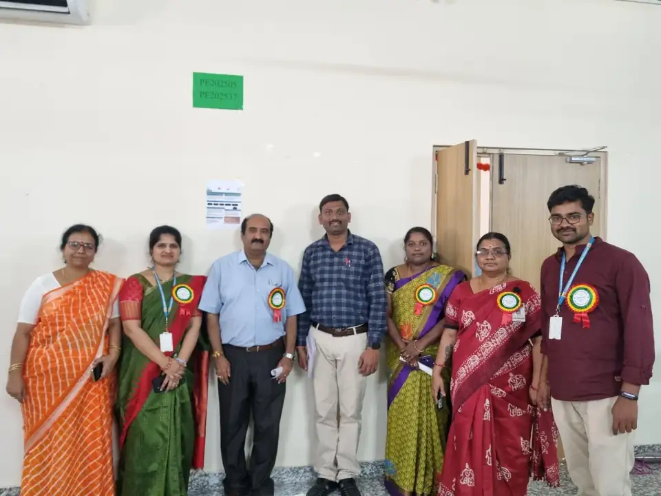 Faculty and organizers together at a department academic event.